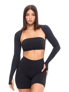 Black Compressive Seamless Top, Black Micro-elastic Nylon Top, High Stretch Athleisure Tops For Night Out, Black Tops With 4-way Stretch For Pilates, Black Top For Pilates With 4-way Stretch, Black Tops For Pilates With 4-way Stretch, Functional Seamless Black Tops, Black Elastane Workout Top, Black Elastane Tops For Workout