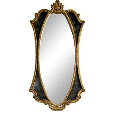 an ornate gold and black mirror on a white background