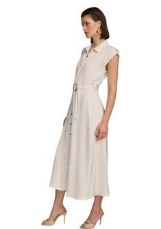 Tied at the waist to highlight your silhouette, this shirtdress from Donna Karan takes you stylishly from work to weekend. | Donna Karan New York Women's Short Sleeve Tie Waist Shirtdress, Medium Chic Shirt Dress With Placket For Work, Elegant Summer Collared Shirt Dress, Elegant Tie Waist Shirt Dress For Work, Elegant Shirt Dress With Tie Waist For Work, Chic Spring Shirt Dress For Work, Chic Spring Workwear Shirt Dress, Casual Office Shirt Dress For Spring, Chic Shirt Dress With Tie Waist For Day Out, Elegant Summer Belted Shirt Dress