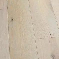 an image of white wood flooring that looks like it has been cleaned and polished