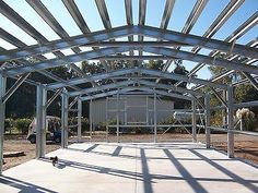 the inside of a building with metal framing