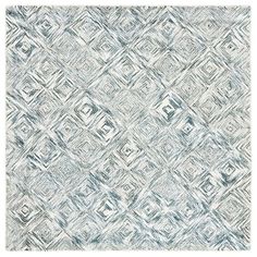 an abstract rug with blue and white colors