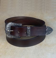 -  100% genuine leather. -  Custom engrave option. - Width - 1.5 inches,  -  High quality buckle. Personalized leather belt for men, custom belt for men with mono, monogramed leather belt, leather belt with initials, personalized belts Adjustable Engraved Leather Belt, Classic Hand Tooled Leather Belt Buckles, Classic Brown Belt Buckles With Silver Buckle, Formal Brown Belt Buckles With Silver Buckle, Engraved Leather Western Belt, Engraved Leather Belt Buckles, Adjustable, Western Style Engraved Leather Belt, Classic Hand-tooled Leather Belt, Classic Hand Tooled Leather Belt