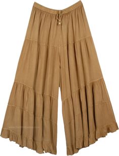 A relaxed pair of long solid khaki palazzo pants for the summer season. The huge flare gives it a feminine yet cool bohemian look, almost looks like a skirt with divided legs. You can mix and match the styles and wear them with tops of different colors. It has an elastic waistband and drawstrings for extra comfort. These casual summer day pants will go with every style and fashion. You can wear them with flats or heels. You can wear jewelry and accessorize yourself. The fabric is lightweight and Bohemian Summer Pants In Solid Color, Summer Khaki Cotton Wide Leg Pants, Bohemian Summer Pants, Bohemian Solid Wide Leg Pants For Beach, Solid Color Summer Wide Leg Full Length Pants, Summer Solid Color Wide Leg Pants, Hippie Wide Leg Pants For Spring, Neutral Color Bohemian Wide Leg Pants For Beach, Bohemian Wide Leg Pants For Vacation