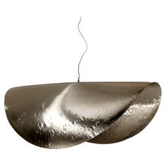 a large metal object hanging from the ceiling