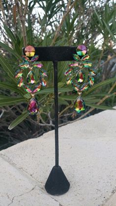 "Fun and sparkly green iridescent earrings! Color: vitrail/ green Style: pierced setting Size: .2.5\" long Need a matching bracelet? https://etsy.me/3LeGE6j Or matching ring?! https://etsy.me/3sle1v1" Multicolor Crystal Earrings With Sparkling Stones, Iridescent Jeweled Jewelry For Parties, Rainbow Drop Earrings For Party, Green Sparkling Jewelry For Party, Sparkling Green Jewelry For Party, Green Crystal Earrings With Sparkling Stones For Party, Glamorous Multicolor Jeweled Crystal Earrings, Green Jeweled Crystal Earrings, Green Jeweled Crystal Drop Earrings