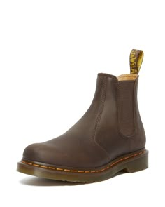 PRICES MAY VARY. Crazy Horse is heavyweight leather with a tough, worn-in appearance. Chelsea boot style Made with all the classic Docs DNA, including grooved sides, heel-loop and yellow welt stitching Built on the iconic Dr. Martens air-cushioned sole, which is oil and fat resistant, with good abrasion and slip resistance Elastic gussets Brown Fall Boots, Brown Doc Martens, Brown Dr Martens, 2976 Chelsea Boots, Dr Martens Chelsea, Brown Leather Chelsea Boots, Chelsea Brown, Chelsea Boots Style, Doc Martens Boots