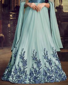 Sky Blue Designer Embroidered Satin Anarkali Gown-Saira's Boutique Blue Floor-length Gown For Eid, Floor-length Anarkali Sharara With Floral Embroidery, Blue Sharara With Floral Embroidery In Traditional Drape, Blue Anarkali Sharara With Floral Embroidery, Blue Sharara With Floral Embroidery And Traditional Drape, Blue Floral Embroidered Wedding Gown, Blue Floral Embroidery Wedding Gown, Blue Georgette Choli With Floral Embroidery, Blue Lehenga With Sheer Dupatta