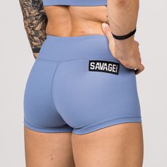 These Butter Soft Booty Shorts are all the rage! Periwinkle blue gym shorts that move with you—not against you. Our classic solid color booty shorts are a must-have for every woman that is serious about her fitness journey. Savage classic booty shorts are custom-made with a perfect blend of Butter Soft nylon and spandex. Our 4-way stretch performance fabrics are soft, comfortable, squat proof, and stay in place so you can achieve full range of motion in and out of the gym. With our light blue sp Fitted Solid Color Squat Proof Shorts, Squat Proof Solid Athletic Shorts, Squat Proof Sporty Shorts, Solid Squat Proof Workout Shorts, Cheerleading Athleisure Shorts, Solid Squat Proof Athletic Shorts For Gym, Squat Proof Solid Shorts, Squat Proof High-waisted Sports Shorts, Sporty Squat Proof Shorts