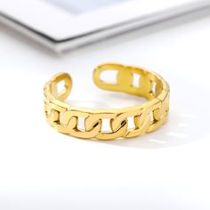 Adjustable Cuban link ring that pairs perfectly with other jewelry pieces or by itself. Your new favorite addition to your every day ring stack! Makes for a perfect gift for your loved ones or for yourself. Made of stainless steel and 18K gold-plated or silver plated - Tarnish resistant - Rust Free - Waterproof & Sweat-proof - Will not discolor - Hypoallergenic Material: Stainless Steel Color: 18K Gold Plated, Silver Plated Metal Promise Ring With Adjustable Chain, Trendy Open Ring In Stainless Steel, Trendy Stainless Steel Open Ring, Tarnish Resistant Metal Stackable Open Rings, Adjustable Gold Chain Ring, Tarnish Resistant, Adjustable Tarnish Resistant Gold Chain Ring, Adjustable Gold Stackable Chain Ring, Adjustable Gold Chain Ring With Open Design, Adjustable Gold Open Chain Ring