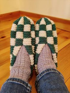 A rich forest green and natural white combination that are warm and cozy. Checkerboard slippers the way Grandma made them with a twist. Worked in wool blended with nylon, these slippers are wonderfully warm and long lasting! Two colours of wool are knit together to create a warm slipper with tons of cushioning.  Each pair is made to order, please see shipping times to estimate arrival. Message me for availability of other colours or any questionsy Comfortable Green Indoor Slippers, Green Comfortable Slippers With Round Toe, Comfortable Green Slippers For Winter, Comfortable Green Winter Slippers, Green Slip-on Winter Slippers, Green Casual Slippers For Winter, Checkerboard Slippers, Knit Slippers, Wool Slippers