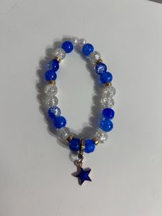 ROYAL blue handmade star bracelet Casual Blue Adjustable Charm Bracelet, Handmade Blue Spiritual Beaded Bracelets, Handmade Blue Spiritual Bracelet, Blue Star Charm Jewelry, Adjustable Stretch Bracelet With Star Charm As Gift, Blue Star Charm Jewelry As Gift, Blue Star Charm Jewelry For Gift, Blue Jewelry With Star Charm For Jewelry Making, Blue Jewelry With Star Charm For Gifts