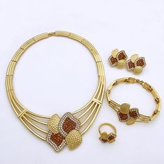 Afraic Jewelry -Gold Color Jewelry Set For Women Inlays White Rhinestone Necklace Earrings Bracelets Rings Set Wending Party Gift material: Zinc alloy key words: bowknot Shape Jewelry for women Inlays White Rhinestone Alloy Necklace Style: African fashion 4 piecese jwelry set for women Style: TRENDY Shape\pattern: Butterfly Production process: Three times in the plating Plating color: gold Origin: Mainland China Occasion: Engagement Model Number: 170 Metals Type: Zinc alloy Material: Metal MOQ: 1Set Jewelry Sets Type: Necklace/Earrings/Ring/Bracelet Item Type: Jewelry Sets Included Additional Item Description: Necklace earring ring bracelet Gender: Women Model Number:3256803884042116 Product information: Material:Zinc alloy Color: Gold Color Product Package Details: 1 Set (Neckace, Bracele Plated Alloy Costume Jewelry Sets, Plated Alloy Jewelry Sets For Gifts, Rose Gold Alloy Jewelry Sets Gift, Gold Plated Clavicle Chain Jewelry Sets For Parties, Plated Metal Jewelry Sets For Party, Metal Jewelry Sets With Plating For Gifts, Adjustable Alloy Jewelry Sets As Gifts, Adjustable Alloy Jewelry Sets As A Gift, Costume Jewelry Sets As Gift