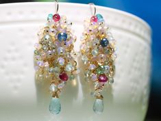 "THE JEWELRY IS SHIPPED via DHL EXPRESS (2-5 days delivery door to door). THE DHL SHIPPING COST IS INCLUDED IN THE PRICE. The Appassionata Earrings - Ethiopian Opal Long Cluster Earrings, Statement Earrings with Paraiba Tourmaline, Pink Tourmaline and Aquamarine ► Measurements / Details: - Length including earwire: 2.32\" (~5.9 cm) *can be made shorter per request - Gold: High quality Gold Filled - Silver: High quality Sterling Silver ► Gemstones: The earrings include excellent AAA quality gemst Fusion Style Party Earrings With Gemstone Accents, Fusion Multi-stone Earrings For Party, Multicolor Gemstone Accented Earrings For Wedding, Multicolor Gemstone Accent Earrings For Wedding, Multi-stone Dangle Earrings For Party, Briolette Earrings With Gemstone Accents For Wedding, Ethiopian Opal Earrings, Earrings Opal, Gemstone Earrings Gold