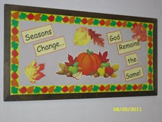 a bulletin board with words that say seasons change and fall leaves on the front wall