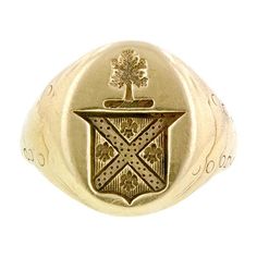 Measuring app. 18mm at widest, featuring a crest, fashioned in 14k. Circa 1940. Size 9.25. Heirloom Oval Signet Ring With Coat Of Arms, Classic Oval Signet Ring With Coat Of Arms, Classic Yellow Gold Engraved Ring With Coat Of Arms, Formal Yellow Gold Signet Ring With Coat Of Arms, Formal Gold Signet Ring With Coat Of Arms, Formal Yellow Gold Engraved Ring With Coat Of Arms, Classic Coat Of Arms Ring, Formal Yellow Gold Coat Of Arms Ring, Classic Collectible Signet Ring With Coat Of Arms