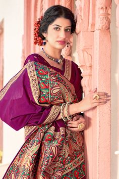 This Saree is Ready to Wear (With Fall and Pico Done). A designer saree in Purple Color. It has intricate design all over the saree. This saree is a suitable amalgamation of style and grace that is required from an ethnic wear. The saree is ideal for any formal gathering. The saree comes with an unstitched blouse of corresponding color and design as shown in the picture. Banarasi Silk Designer Purple Color Saree Fabric Type: Soft Banarasi SilkPrimary Colour: PurpleSecondary Colour(s): Golden Sar Bollywood Style Jamawar Pre-draped Saree For Diwali, Bollywood Style Jamawar Pre-draped Saree For Puja, Embroidered Paithani Silk Saree, Jamawar Blouse Piece For Puja, Paithani Silk Sharara For Eid, Purple Bollywood Saree With Unstitched Blouse, Bollywood Style Purple Saree With Unstitched Blouse, Bollywood Banarasi Silk Saree For Navratri, Navratri Bollywood Banarasi Silk Saree