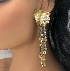 Matte Gold Jhumka/Indian Jhumka/Golden Pearl Jhumka/Traditional Jhumka/Ethnic Golden Matte/Gold finish earrings/Ethnic Indian Long Jhumka Length: Approx. 4.5 Inches This pair of earring is made in Matte Gold finish with Semi precious stone beads with Push back closure. Very Elegant and stylish, these earrings can be paired with any traditional Indian or Western Attire depending upon the occasion and the theme. Very lightweight, hand carved and made with with extreme love and care. This earring w Unique Metal Earrings For Festive Occasions, Unique Festive Metal Earrings, Festive Unique Latkan Earrings, Elegant Plug Earrings With Latkans For Party, Bohemian Dangle Clip-on Earrings For Party, Elegant Latkans Plug Earrings For Party, Festive Metal Pearl Earrings For Pierced Ears, Festive Single Dangle Pearl Earring, Celebration Dangling Bead Drop Earrings