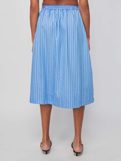 A classic button down, pleated midi skirt with a defined waist and the ultimate feminine vibes. Pairs well with a white tee and whatever your weekend plans are… (This one comes in Day Trader.) | Women's Idra Skirt in Day Trader | Ethical Essentials Feminine Vibes, Defined Waist, Pleat Skirt, Day Trader, Weekend Plans, Pleated Midi Skirt, White Tee, Jeans For Sale, Pima Cotton