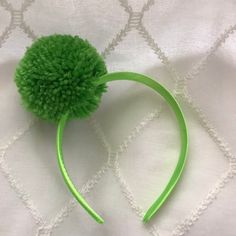 Green pom pom on a bright green satin-covered headband.  Pom is about three inches around and very full.  Headband is a slightly different, bright hue of green.  Fun! Green Spring Headband Hair Accessories, Green Headband Hair Accessories For Spring, Adjustable Green Hair Accessories With Headband, Green Headband For Party, Green Hair Accessories With Matching Headband For Party, Broccoli Costume, Niagara Falls Ny, Green Yarn, Green Inspiration