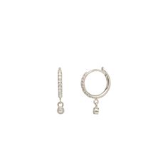 14k gold white pave diamond medium hinge huggie hoops with dangling bezel set diamonds SPECIFICS• hoops are approx. 12mm diameter • approx. 16mm drop • white pave diamonds .13 ctw• sold as pair or single Sterling Silver Huggie Jewelry With Pave Setting, White Gold Dangle Huggie Earrings Fine Jewelry, Diamond Dangle Huggie Earrings Fine Jewelry, Dangle Huggie Earrings With Diamond Accents, Minimalist Diamond Dangle Earrings With Accents, Diamond Dangle Hoop Earrings Fine Jewelry, Dangle Diamond Hoop Earrings Fine Jewelry, Diamond Dangle Hoop Earrings, Minimalist Huggie Earrings With Pave Setting