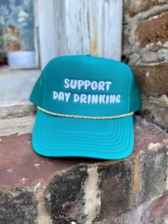 Stay cool and protected while showing your love for day drinking with our Support Day Drinking Foam Trucker hat. The foam front panel provides a comfortable fit and the mesh back allows for breathability. Perfect for outdoor events or everyday wear.100% Polyester Front / 100% Polyester Mesh Back Adjustable Snap OSFM - Adult (6 1/2 - 7 5/8) ships within 10 business days Green Adjustable Snapback Hat With Short Brim, Green Adjustable Snapback Hat, Green Adjustable Brimmed Baseball Cap, Adjustable Green Trucker Hat With Short Brim, Green Adjustable Trucker Hat With Short Brim, Fun Adjustable Green Hat, Support Day Drinking, Woman Hats, Lake Trip