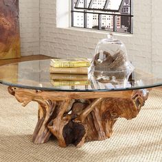 a glass table sitting on top of a rug