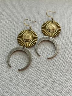 "Mixed metal brass and silver plated brass sun and moon earrings.  Lightweight and great everyday earrings. approximate 2.5\" length" Brass Moon Shaped Festival Earrings, Moon-shaped Brass Earrings For Festival, Festival Moon-shaped Brass Earrings, Moon Phase Brass Earrings For Festival, Festival Moon Phase Brass Earrings, Nickel Free Moon Shaped Brass Earrings, Metal Moon-shaped Earrings For Festivals, Festival Metal Earrings With Moon Charm, Brass Festival Earrings With Moon Charm