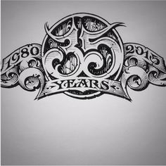 a drawing of an ornate design with the words 50 years written in black ink on a white background