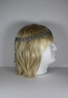 Elegant headpiece featuring zinc-coated steel chainmail rings, glass beads, and metal chains. Mail circlet is 22 inches in circumference.  ~Item Description~ Looking for a unique, classy accessory for your next formal event? The Chainmail Diadem is perfect for you! Each diadem features a headband of 10mm zinc-coated chainmail rings that is approximately 22 inches in length. A net of glass beads and metal chains cascades down the back, while the front of each piece features a chainmail dag and more dangling beads. These headpieces are lightweight, sturdy, and tangle-resistant for easy storage. If you would like to order this item in a color or size that is not currently available, please message us to find out more about our custom order options.  If you like this listing, you may also enjo Chain Mail Head Piece, Chainmail Headpiece, Medieval Headpiece, Elegant Headpiece, Chainmail Ring, Tiara For Bride, Gift For Bride To Be, Wedding Accessory, Fantasy Wedding