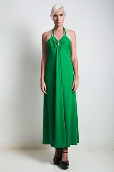 vintage hostess maxi dress SMALL Sgreen halter with tie back, maxi lengthgathered rhinestone detail on bodicenylon zipper closure, dress is unlined----- Measurements (taken flat)Shoulders : 7"Bust : 34"Waist : 28-30"Hips : 40"Length : 50"Sleeve Length : -Tag : -Pinned on model? : NoNote: some missing rhinestones, please see closeup photo Vanessa is 5′10″ tall with 33" bust, 26" waist, and 36" hipsVisit { ShopRabbitHole.com } for even more vintage!Etsy Shop : www.etsy.com/shop/shoprabbitholeMore 70s Green, Closeup Photo, Halter Maxi Dress, Halter Maxi, Empire Dress, Halter Maxi Dresses, Tie Back, Vintage 70s, Etsy Vintage