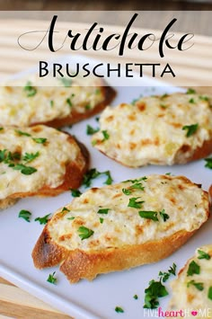 bread topped with cheese and parsley on a white plate