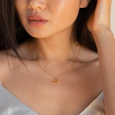 Wear the initials of someone close to you and feel their presence always. Our dainty letter necklace in gold is a great option to subtly keep your loved ones close and works perfectly as a romantic gift for a birthday or anniversary.• Material: High Quality Solid 925 Sterling Silver• Finish: 18K Gold• Dimension: ~ 10mm Dainty Initial Pendant on an adjustable 16 to 18 inch chain SKU: RR-NR100 Caitlyn Minimalist, Letter Charm Necklace, Dainty Initial Necklace, Script Initial, Elegant Script Fonts, Necklace Delicate, Letter Charm, Gift For Sister, Personalized Gifts For Her