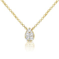 a yellow gold necklace with two pear shaped diamonds on the front and back of it