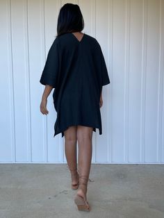 Crafted from 100% cotton, our Miyu Mini Dress falls just above the knee and is adorned with intricate hand embroidery. The perfect blend of comfort and artistic design, makes it a versatile choice for any occasion. Cotton Dresses For Fall Vacation, Cotton Lagenlook Dress For Vacation, Black Cotton Tunic Dress, Oversized Cotton Dress For Beach Cover-up, Fall Vacation Cotton Tunic, Black Cotton Tunic For Summer, Black Cotton Embroidered Dress, Black Bohemian Linen Summer Dress, Black Bohemian Linen Dress For Summer