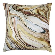 a pillow with an abstract design on the front and back of it, in brown, beige