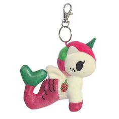 a keychain with a pink and green animal on it