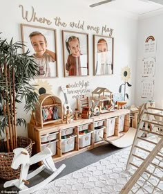 a child's room with pictures on the wall