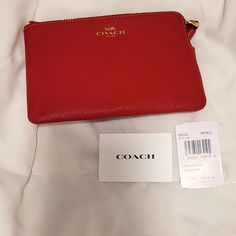 Brand New With Tags Never Used. Red Amazing Wristlet Leather Coach. Coach Pouch Clutch As Gift, Red Zipper Pouch Wristlet For Gift, Red Pouch As Gift, Red Pouch As A Gift, Red Zipper Pouch Wristlet As Gift, Red Wristlet With Zipper Pouch As Gift, Red Wristlet With Zipper Closure As Gift, Red Wristlet Gift, Coach Red Wristlet With Zipper Pouch