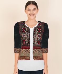 Experience Fashionable elegance with this Mashroo Cotton Silk Kutchi hand embroidered mirror work Jacket crafted from superior cotton silk blend for comfort and breathability. The Kutchi hand embroidered on its front crafted by artisans of Kutch which reflects of colourful Kutch. Look & feel your best with this timeless piece. Transitional Long Sleeve Choli, Bohemian Nehru Jacket With Intricate Embroidery, Bohemian Outerwear With Embroidered Border For Festive Occasions, Traditional Fitted Outerwear With Embroidered Border, Festive Outerwear With Woven Motifs, Fitted Traditional Outerwear With Embroidered Border, Bohemian Choli For Navratri, Bohemian Fitted Outerwear With Intricate Embroidery, Fitted Bohemian Outerwear With Intricate Embroidery