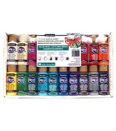 an assortment of acrylic paints in a box