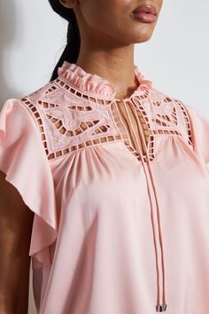 Made in our favorite Silk blend, our Embroidered Flutter Sleeve Shirt isn't your basic top - delicate openwork embroidery detailing the bodice yoke, while the soft flutter sleeves lend a feminine twist to this must have Spring top. Silk Blend Shirt with openwork Embroidery & Flutter Sleeves 91% Silk, 9% Elastance Runs true to Size Model is 5'9" and wearing size S Measurements: 25" from shoulder to hem (approx. measurements for size Small) Dry Clean Only Imported Style #: ETR41318 Summer Ruffle Sleeve Blouse With Lace Top, Summer Blouse With Lace Top And Ruffle Sleeves, Spring Tops With Broderie Anglaise And Ruffled Collar, Spring Short Sleeve Embroidered Top For Daywear, Feminine Embroidered Summer Top For Daywear, Feminine Fitted Embroidered Top With Short Sleeves, Spring Flutter Sleeve Blouse With Lace Top, Summer Feminine Blouse With Flutter Sleeves, Feminine Summer Blouse With Flutter Sleeves