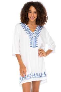 EMBROIDERED BOHO SWIMSUIT COVER UP can be worn as a sundress, beach dress, or tunic top paired with leggings or jeans for everyday wear BEAUTIFUL CUSTOM EMBROIDERY ACCENTS THE NECK AND HEM. Side slits at the hem give you ease of movement. Wear loose as a beach dress or belted over leggings 3/4 LENGTH SLEEVES keep you cool and comfortable on hot days while providing arm coverage. The perfect bikini cover up resort wear for lounging poolside or on a cruise MADE FROM 100% HIGH-QUALITY BREATHABLE RA White Cotton Cover-up For Warm Weather, Summer V-neck Relaxed Fit Tunic, Casual Stretch Tunic For Summer, White Cotton Dresses For Vacation, White Cotton Dress For Vacation, White Cotton Spring Cover-up, Spring White Cotton Cover-up, Casual Cotton Beach Dress, Casual Flowy Tunic Cover-up