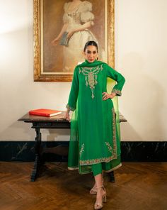 3 piece suit comes with matching pants, and dupatta. Shirt length: 45 inches The shirt and pants are made of pure raw silk and the dupatta is organza. This item includes the following handwork: aari, kora, and zardozi with pearls, sequins, and resham thread. This outfit including the sleeves is not see through. Orders cannot be changed or cancelled after 30 minutes of completion of the order. We do not offer returns or exchanges on this item. We cannot make any exceptions to this policy since th Unstitched Tissue Silk Salwar Kameez, Transitional Designer Silk Palazzo Set, Elegant Unstitched Suit With Cutdana, Festive Unstitched Tissue Silk Suit With Naqshi, Silk Salwar Kameez With Cutdana For Eid, Semi-stitched Organza Palazzo Set With Cutdana, Eid Silk Salwar Kameez With Cutdana, Festive Tissue Silk Salwar Kameez With Naqshi, Eid Traditional Wear With Naqshi In Tissue Silk