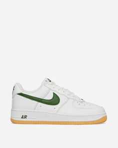 Iconic AF1 style in a fresh forest green and white colorway perfect for showcasing on social. Customized like the original 1984 Color Of The Month releases, this must-have sneaker will elevate any Instagram fit with it's standout hue and perforated toebox detailing. Included shoe brush makes caring for the supple leather upper effortless so these streetwear staples can be flaunted again and again. Enduring quality and customization in every step. Green Throwback Sneakers For Streetwear, Throwback Lace-up Sneakers With Gum Sole, Nike Air Force 1 Green With Gum Sole, Nike Custom Sneakers With Gum Sole For Sports, Throwback Sneakers With Gum Sole For Sports, White Throwback Sneakers With Gum Sole, White Low-top Throwback Sneakers, Sporty Nike Air Force 1 With Gum Sole, Throwback Low-top Sneakers With Gum Sole