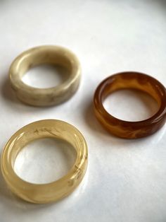 "Complete your perfect look with the acrylic resin rings from Vielring. These beautiful plastic rings belong to our adjustable ring category. They are adjustable in size and can be customised. The perfect gift for you or one of your loved ones.♡ ∙Shipping is free of charge within Germany and will be shipped within one working day. - Material: plastic, acrylic resin - Dimensions: ~ 17 mm - All our items are made by hand, with love and care.♡ ∙Packaging∙ - All orders are packed by us in a high quality \"multi-ring\" jewellery bag.♡ ∙More from us∙ https://www.etsy.com/de/shop/Vielring ∙Social Media∙ - Instagram: https://www.instagram.com/vielring - Facebook: https://www.facebook.com/vielring - Pinterest: https://www.pinterest.de/Vielring/_shop - TikTok: https://www.tiktok.com/@vielring Thank Handmade Vintage Resin Rings, Trendy Clear Round Rings, Vintage Resin Rings For Gifts, Clear Resin Rings, Trendy Plastic Rings As Gifts, Vintage Plastic Jewelry For Gifts, Rings Multiple, Acrylic Rings, Plastic Rings