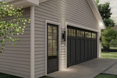 an image of a garage with two doors on the front and one door open to let in light