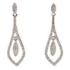 A unique piece within our carefully curated Vintage & Prestige fine jewellery collection, we are delighted to present the following: These diamond drop earrings are set among 18K White Gold and Diamonds Est 0.39ct. These pretty earrings measure 30mm in length. Luxury Diamond Drop Earrings With Lever Back, Luxury Pear-shaped Single Cut Diamond Earrings, Formal Pear-shaped Diamond Earrings With Single Cut Diamonds, Luxury Pave Set Diamond Dangle Earrings, Luxury Diamond Dangle Earrings With Pave Setting, Formal Teardrop Single Cut Diamond Earrings, Platinum Diamond Earrings With Pave Setting For Formal Occasions, Formal Platinum Diamond Earrings With Pave Setting, Marquise Single Cut Diamond Earrings For Formal Events