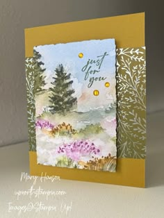 a card with watercolor flowers on it and the words just for you written in green ink