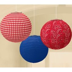 three red, white and blue paper lanterns hanging from strings